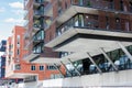 Contemporary Residential Building brick facade houses on stilts metal pillars support beam Hamburg center downtown Royalty Free Stock Photo