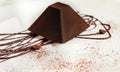 Chocolate truffle cake in pyramid shape Royalty Free Stock Photo