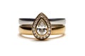 A Contemporary Ring Double Band A Pearshaped Diamond White Background. Generative AI