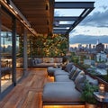 Contemporary rooftop terrace with comfortable lounging areas and city views Royalty Free Stock Photo