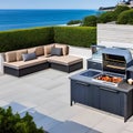 A contemporary rooftop terrace with comfortable outdoor seating, a built-in barbecue grill, and breathtaking views of the ocean2 Royalty Free Stock Photo