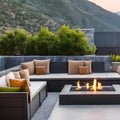 A contemporary rooftop terrace with comfortable outdoor seating, a fire pit, and breathtaking views of the mountains5, Generativ Royalty Free Stock Photo