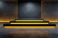 Modern stage platform with glowing yellow lights and concrete walls Royalty Free Stock Photo