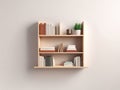nice looking small bookshelf on wall with books with white background