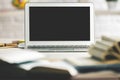 Contemporary table with empty laptop screen Royalty Free Stock Photo