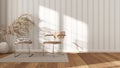 Contemporary waiting sitting room in white and beige tones. Rattan and steal armchairs, side table, carpet, window and decors.