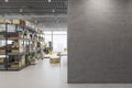 Contemporary warehouse interior with empty mock up place on wall, racks, boxes, city view and daylight. Logistics and shipping Royalty Free Stock Photo