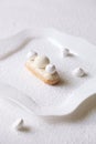 Contemporary White Chocolate and Coconut Eclairs