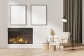 Contemporary white modern living room interior with fireplace, armchair. Two posters in a row template mockup on wall Royalty Free Stock Photo