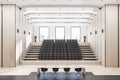 Contemporary wooden auditorium interior with seatings, city view and daylight.