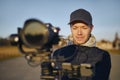 Content creator during filming with camera and gimbal Royalty Free Stock Photo