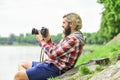 Content creator. Man bearded hipster photographer hold vintage camera. Masterpiece shot. Man with beard shooting photos