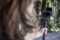 Young man filming with a camera gimbal Royalty Free Stock Photo