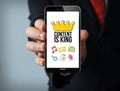 content is king businessman smartphone Royalty Free Stock Photo