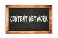 CONTENT  NETWORK text written on wooden frame school blackboard Royalty Free Stock Photo