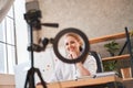 Contented HR director smiling to the camera at job interview