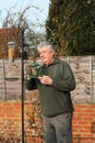 Contentment in feeding the birds. Royalty Free Stock Photo