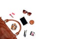 Contents of female handbag - sunglasses, makeup items, smartphone, jewellery Royalty Free Stock Photo
