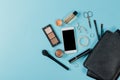 Contents of woman`s bag.Top view of Women bag and lady stuff with copyspace on pink background Royalty Free Stock Photo
