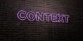 CONTEXT -Realistic Neon Sign on Brick Wall background - 3D rendered royalty free stock image