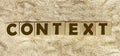 CONTEXT Word written on wooden cubes