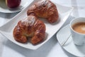 Continental breakfast with coffee , croissants and fresh fruit Royalty Free Stock Photo