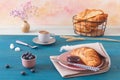 Continental breakfast with croissants, fruits, jam and coffee Royalty Free Stock Photo