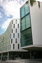 Continued and wavy gray facade of Vicki Sara Building with array of rectangular colorful windows, University Technology Sydney UTS