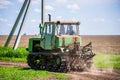 Continuous caterpillar tracks of the bulldozer. Close up detail of a metall crawler tractor tracks