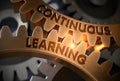 Continuous Learning on Golden Cog Gears. 3D Illustration. Royalty Free Stock Photo