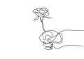 Continuous line drawing of a hand holding rose flower. Hand`s woman with a flower isolated on white background. Give a sign of Royalty Free Stock Photo