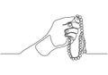 Continuous line drawing hand holding Tasbeeh or prayer beads