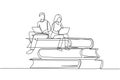 Continuous one line drawing couple with laptop sitting on pile of books together. Freelance, distance learning, online courses,