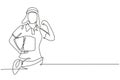 Continuous one line drawing deliverywoman with celebrate gesture, carrying package box to be delivered to customers with best