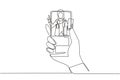Continuous one line drawing hand holding smartphone and there is hijab female doctor coming out of smartphone screen holding Royalty Free Stock Photo
