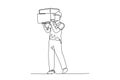 Continuous one line drawing young happy delivery courier man gives thumbs up gesture while lift up carton box packages. Delivery