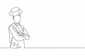 Continuous one line drawing young male chef pose cross his arms on chest before cooking at kitchen. Professional job profession