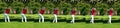 Continuous shot of tee off at golf, older lady in white pants and red shirt hits the golf ball over the green, composite time