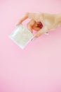 Contraception. Birth Control Pills and an unwrapped Condom. Colo Royalty Free Stock Photo