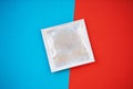 Contraception. Birth Control Pills and an unwrapped Condom. Colo Royalty Free Stock Photo