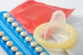 Contraceptive birth control pill pack with a condom Royalty Free Stock Photo