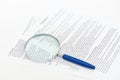Contract with a magnifying glass