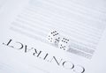 Contract paper with gambling dices Royalty Free Stock Photo