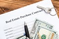 Contract for purchase house with key of house and money on the table Royalty Free Stock Photo