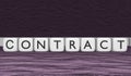 Contract word on white cubes in black letters on a violet background. 3d rendering Royalty Free Stock Photo