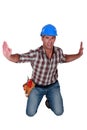 Contractor being squeezed Royalty Free Stock Photo