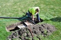 A contractor cleaning out a rural home septic tank. Royalty Free Stock Photo