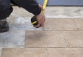 Tiling a basement floor with ceramic tiles