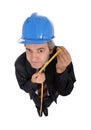 Contractor with hard hat and tape Royalty Free Stock Photo