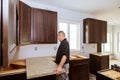 Contractor installing a new laminate kitchen counter top Royalty Free Stock Photo